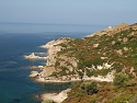 Západní pobřeží se strážní věží Torre Argentina u letoviska Bosa Marina